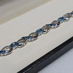 Sterling Silver and Blue Topaz Tennis Bracelet With Matching Necklace Pendant